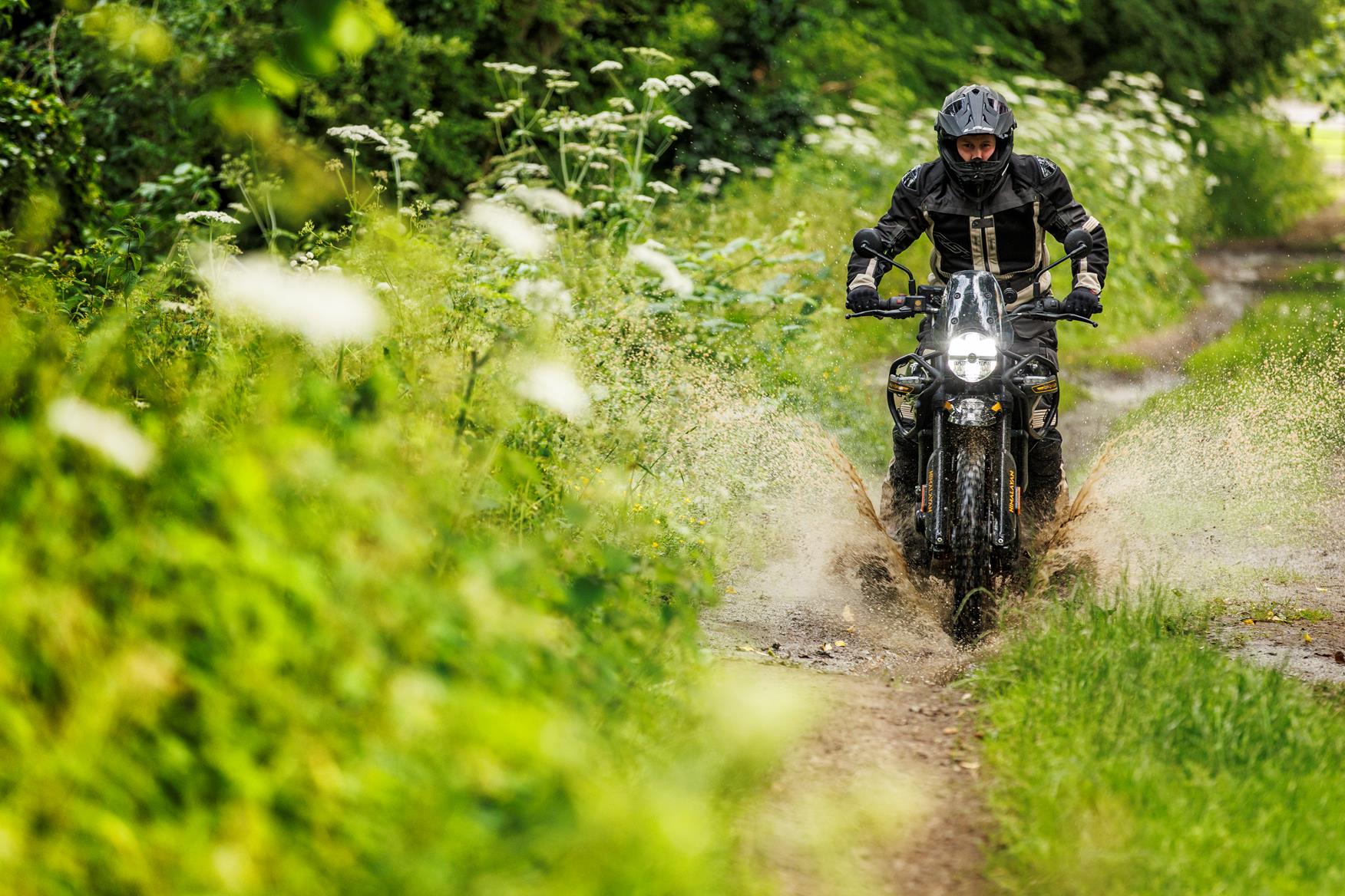 2024-on Royal Enfield Himalayan 450 Joe's Long Term bike exiting a puddle