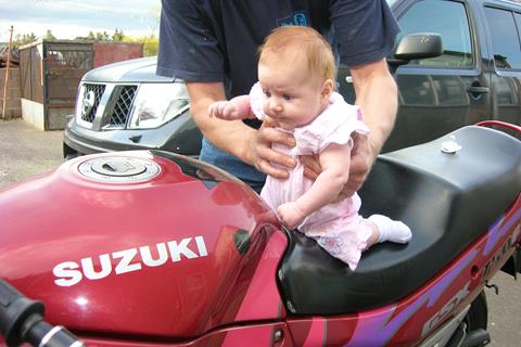 "Now if I can just reach the throttle Dad,I can go to the TT too this year!"