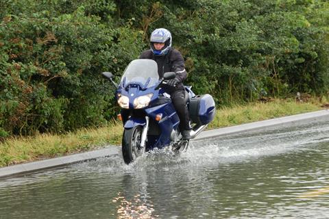 Bikers in Gloucester floods