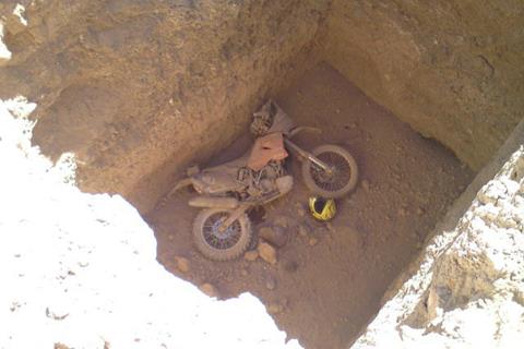 Dakar racer crashes in to 16ft tomb – continues racing!