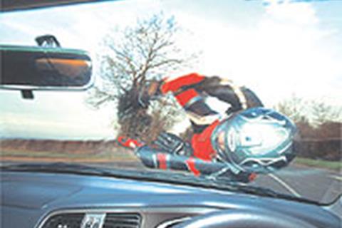 Driver who blocked overtaking biker jailed