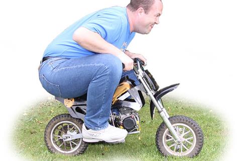 Fat bloke on a moped