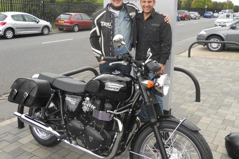 Marcus Mumford collects new Triumph Bonneville