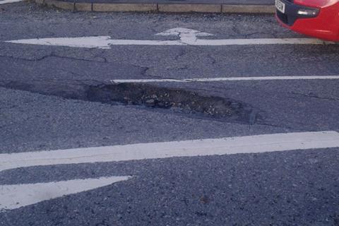 Can you find a bigger pothole than this?