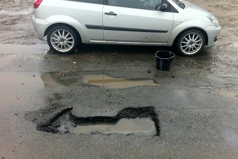 Can you find a bigger pothole than this? 