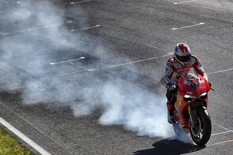 Bayliss shows off front wheel burn out