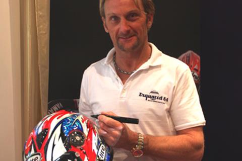 Win a signed Helmet by Carl Fogarty plus a copy of SBKX game and bag!