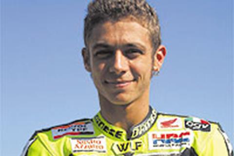 Rossi claims 11th win by 0.1 seconds