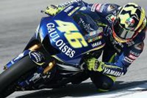 Rossi fights for Qatar win