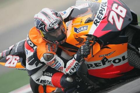 Pedrosa takes first win