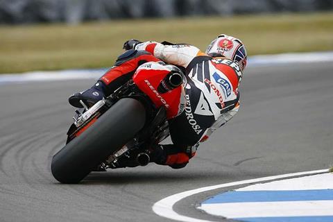 Pedrosa takes pole