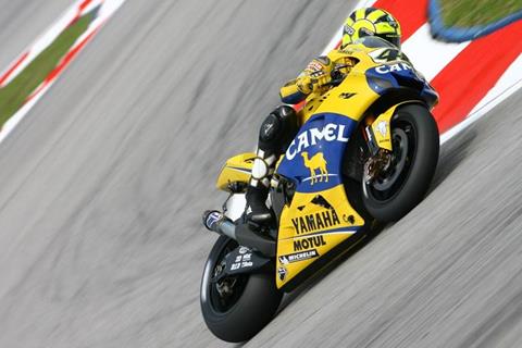 Rossi takes shock pole