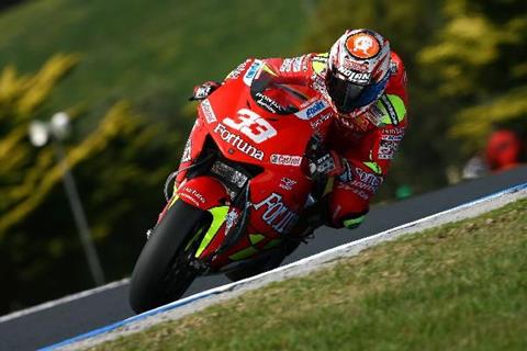 Melandri takes shock win