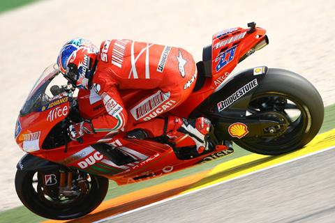 Valencia MotoGP: Casey Stoner shrugs off back injury to dominate in Valencia