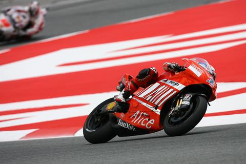 Spanish MotoGP: Casey Stoner fastest in rain-hit free practice