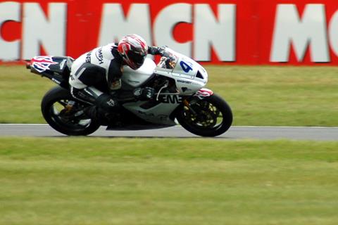 Glen Richards in front of MCN hoardings