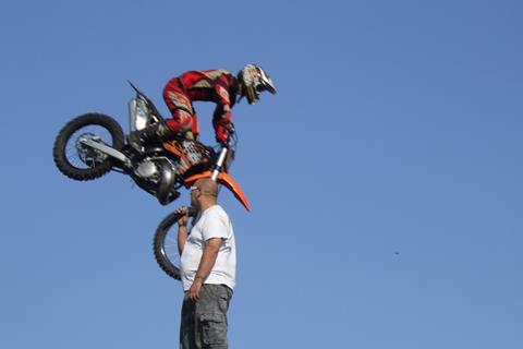 Brands Hatch: Man seen holding up bike singlehandedly!