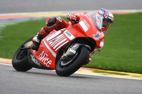 Valencia MotoGP: Casey Stoner romps to ninth pole position