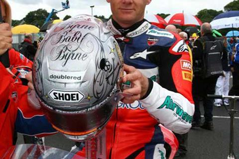 Shane Byrne helmet raises £820