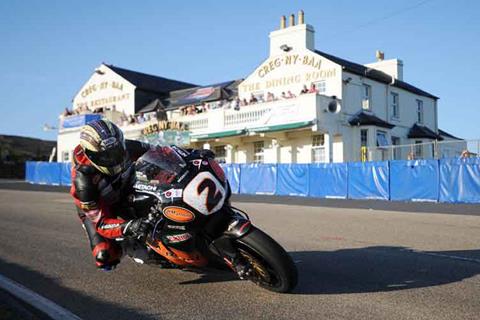 Isle of Man TT: McGuinness sets the pace with 128mph lap