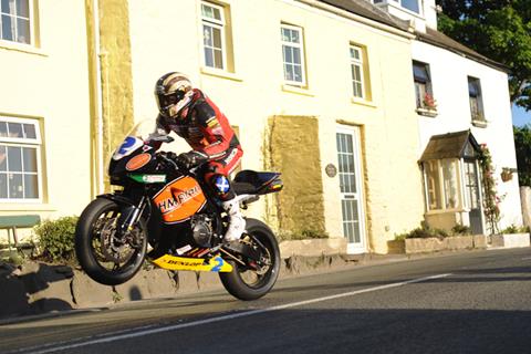 Isle of Man TT: John McGuinness breaks 130mph in practice