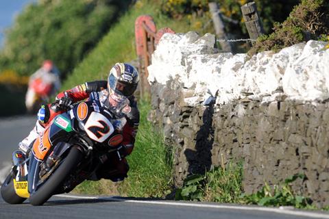 Isle of Man TT: John McGuinness wins Superbike race