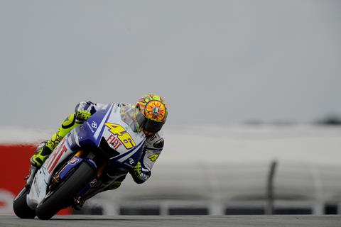 German MotoGP: Valentino Rossi takes pole at soaked Sachsenring