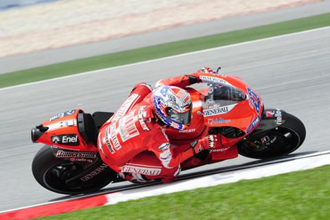 Sepang MotoGP: Casey Stoner fourth after early crash