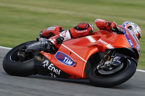 Valencia MotoGP: Casey Stoner on pole for Ducati farewell