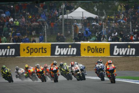 British MotoGP: Stoner dominates wet race