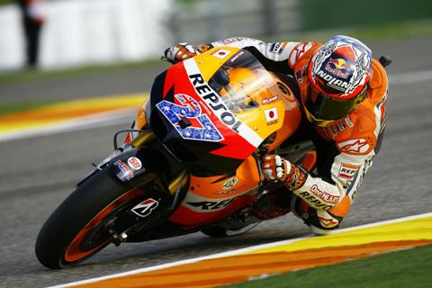 Valencia MotoGP: Stoner secures twelfth pole of season