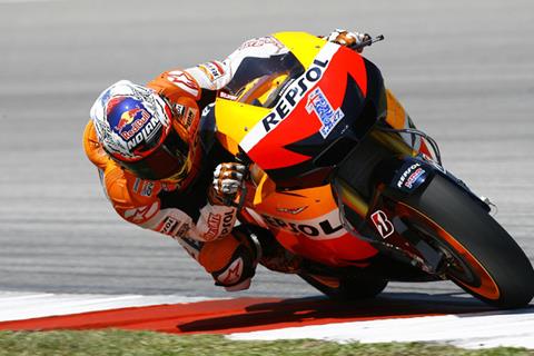 Casey Stoner quickest as storm disrupts first day in Sepang