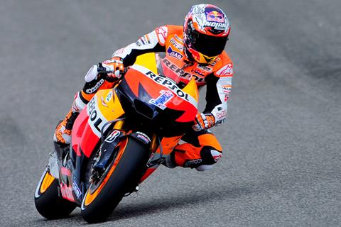 Estoril MotoGP: Stoner takes first pole of 2012