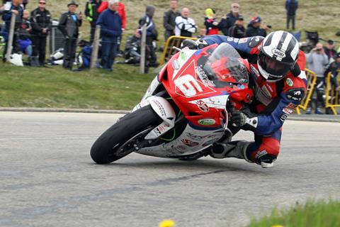 Isle of Man TT: Dunlop takes hat trick with Superstock victory