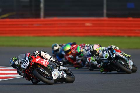 Brookes puts one hand on the trophy with race two win