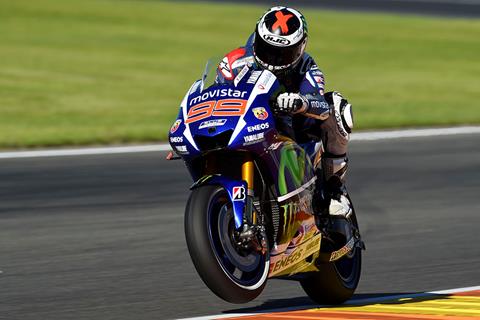 Lorenzo smashes lap record for Valencia pole