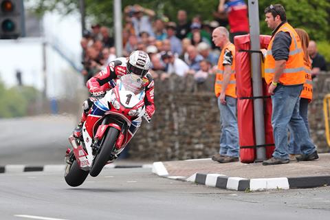 Join John McGuinness on the opening lap of last year's Senior TT