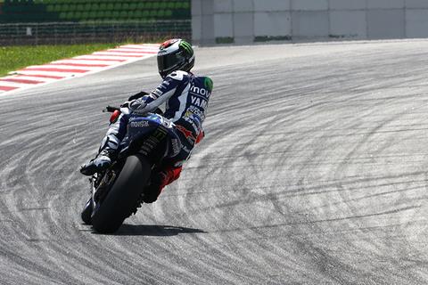 Lorenzo and Rossi go 1-2 on opening day at Sepang