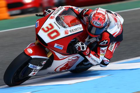 Nakagami tops day one in slippery conditions