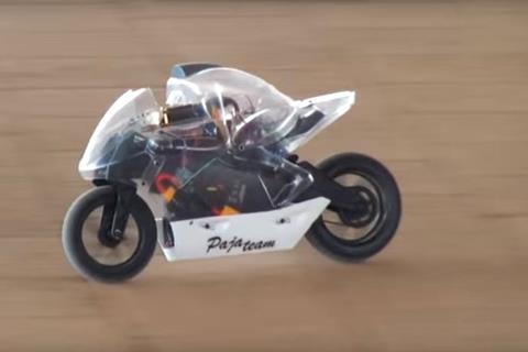 Riderless motorcycle attempts to outperform human riders