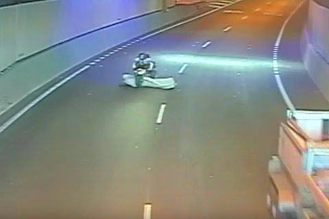 Video: Motorcyclist runs over rogue mattress