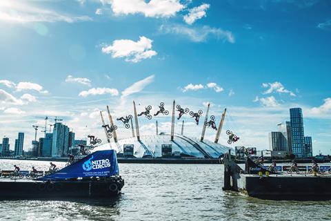 Video: Travis Pastrana backflips river barges