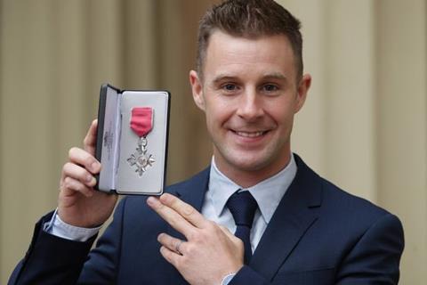 Jonathan Rea collects MBE from Prince William