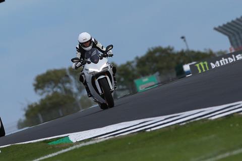 Paralysed fundraiser completes a lap of Silverstone at the British Superbike round for charity