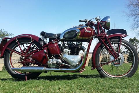 Steve McQueen's Triumph fetches £118,000 at auction