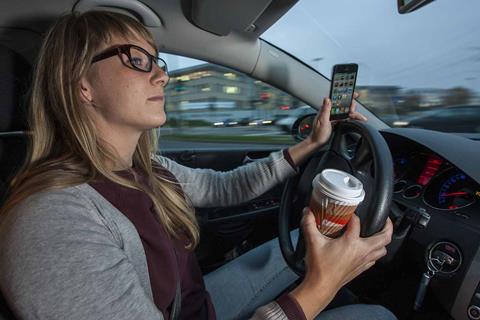 Plans announced to ban all mobile use at the wheel